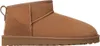 A side view of a single brown UGG boot. Voir les images du produit