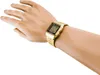 A gold digital watch on a mannequin's wrist. Produktbild-Vorschau