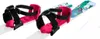 A pair of children's skis with pink bindings and colorful graphics on the skis. Anteprima dell’immagine prodotto