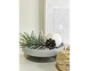 A decorative arrangement on a tray with a candle, pine branch, and pinecone. Produktbild-Vorschau