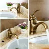 Collage of images showing a retro-style brass faucet in a bathroom sink setting. Produktbild-Vorschau