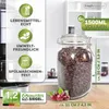 A glass jar filled with coffee beans is shown on a kitchen counter, with marketing text and icons on the left. Produktbild-Vorschau