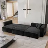 A modern living room with a black sectional sofa, a coffee table, and a plant. Produktbild-Vorschau
