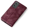A burgundy flip case for a smartphone is shown diagonally on a white background. Produktbild-Vorschau