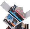 A white, modern, tree-shaped bookshelf filled with books. Náhľad obrázku produktu
