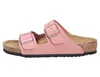 A single pink Birkenstock sandal is shown from the side against a white background. Podgląd zdjęcia produktu