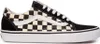 A side view of a Vans Old Skool sneaker with a checkerboard pattern. Voir les images du produit