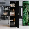 A black metal cabinet with its door open, showing shelves filled with files and books in an office setting. Náhľad obrázku produktu