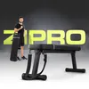 A man stands next to a folded fitness bench with the brand name ZIPRO in large letters behind them. Náhľad obrázku produktu