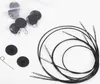 A set of knitting needles and accessories laid out on a white background. Produktbild-Vorschau