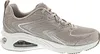 A side view of a single taupe sneaker with glitter accents and a white sole. Voir les images du produit