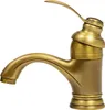 A close-up studio shot of a single antique brass faucet against a white background. Podgląd zdjęcia produktu