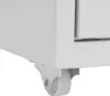 A close-up view of the bottom corner of a gray metal filing cabinet, showing one of its wheels. Náhľad obrázku produktu