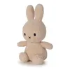 A plush Miffy bunny toy sitting down, facing slightly to the left, against a white background. Produktbild-Vorschau