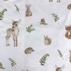 A pattern of woodland animals and foliage on a white background. Produktbild-Vorschau