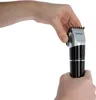 Hands holding a hair clipper. Produktbild-Vorschau