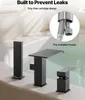 A black bathroom faucet set with a hand shower is installed on the edge of a bathtub filled with water. The image highlights features like drip-free cartridge design and pre-installed hoses. Náhled obrázku produktu