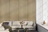 A modern living room with a sectional sofa in front of a textured wall. Náhled obrázku produktu
