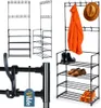 A collage of images showing a black metal coat rack with shoe shelves, an orange coat, a brown hat, and shoes. Anteprima dell’immagine prodotto