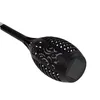 A close-up shot of a black solar garden light shaped like a torch, with a decorative patterned grill and a solar panel on the end. Voir les images du produit