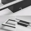 A collage of images showing a modern black rectangular LED ceiling light with a textured white light strip. Voir les images du produit