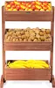 A three-tiered wooden display stand filled with fruits. Náhled obrázku produktu
