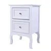A white bedside table with two drawers and silver knobs, shown against a white background. Produktbild-Vorschau