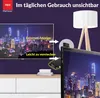 A marketing image showing a TV screen displaying a city skyline, with an external IR sensor with an LED display attached to the top of another TV screen. Text overlays highlight features. Produktbild-Vorschau