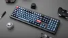 A desk setup with a keyboard, controller, pen, and glasses. Produktbild-Vorschau