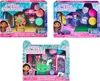 A collage of three Gabby's Dollhouse toy playsets, each featuring characters and accessories. Produktbild-Vorschau
