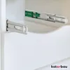 Close-up view of two drawer slides installed inside a white cabinet. Produktbild-Vorschau