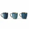 Three blue ceramic mugs are displayed on a white background. Produktbild-Vorschau
