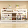 A white loft bed with built-in bookshelves and storage is shown in a child's room. Voir les images du produit