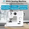 A white sewing machine is placed on a wooden table, with a blurred background of outdoor furniture. Produktbild-Vorschau