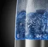 Close-up of boiling water in a glass kettle with a silver base. Anteprima dell’immagine prodotto