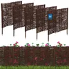 A set of five woven willow garden border fences are displayed against a white background, with a second row of fences with flowers in front of them. Náhľad obrázku produktu