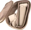 A Braun Silk-épil 9 epilator and its charging adapter are neatly organized inside a beige fabric travel case. Náhľad obrázku produktu