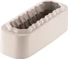 A baking mold with a ridged interior. Produktbild-Vorschau