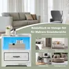 A collage showcasing a white vintage-style nightstand with LED lighting, alongside lifestyle images of the nightstand in different room settings: a bedroom, a living room, a home office, and a reception area. Produktbild-Vorschau