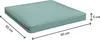 A light blue cushion with dimensions indicated. Produktbild-Vorschau