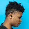 A close-up profile shot of a person wearing black earbuds. Anteprima dell’immagine prodotto