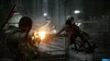 A scene from a video game showing a soldier firing a weapon at an alien creature. Produktbild-Vorschau