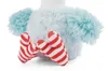 Close-up of the feet and lower body of a plush toy. Voir les images du produit