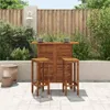 An outdoor bar set with two stools in a patio setting. Náhľad obrázku produktu