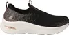 A side view of a black Skechers slip-on sneaker with a white sole. Náhled obrázku produktu