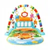 A baby play mat with an arch and hanging toys, including a piano. Produktbild-Vorschau