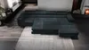 A modern living room with a large sectional sofa. Produktbild-Vorschau