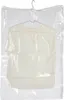 A transparent garment bag with a shirt on a hanger inside. Náhled obrázku produktu