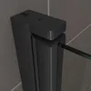 A close-up view of the top corner of a black shower door frame, showing the hinge mechanism and a section of the glass panel. Produktbild-Vorschau