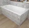 A white bathtub with a gray tiled surround and a wooden floor. Produktbild-Vorschau